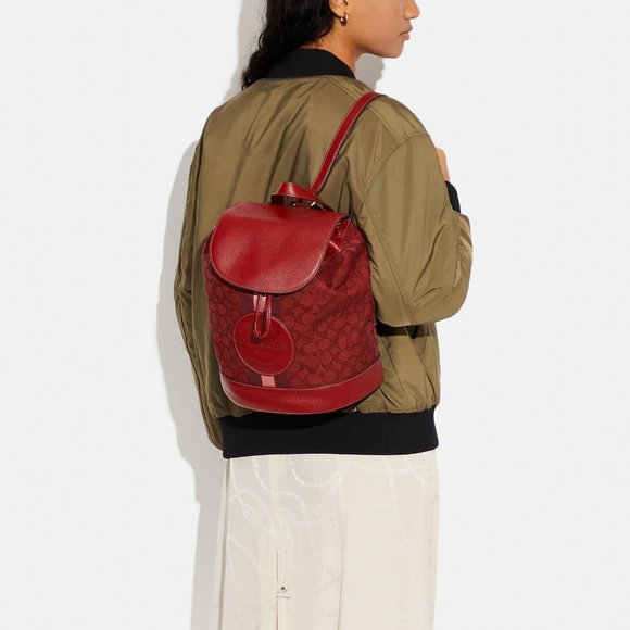 COACH DEMPSEY DRAWSTRING BACKPACK SIGNATURE JACQUARD  WITH COACH PATCH & STRIPE